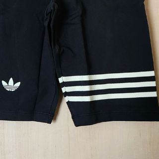 オリジナルス(Originals（adidas）)のアディダス オリジナルス アディカラー バイク レギンス 新品 紙タグ付き 黒(レギンス/スパッツ)