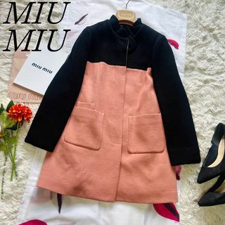 ミュウミュウ(miumiu)の【良品】MIU MIU バイカラーコート ブラック ピンク ロングコート 40(ロングコート)