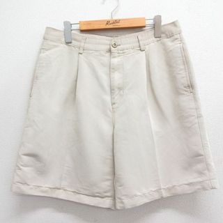 チャップス(CHAPS)のW34★古着 チャップス ゴルフ ショート パンツ ショーツ メンズ ワンポイントロゴ ベージュ カーキ 24may29 中古 ボトムス 短パン ショーパン ハーフ(ワークパンツ/カーゴパンツ)