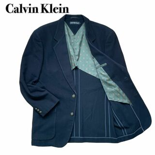 カルバンクライン(Calvin Klein)のカルバンクライン テーラードジャケット 黒 L 鼈甲ボタン(テーラードジャケット)
