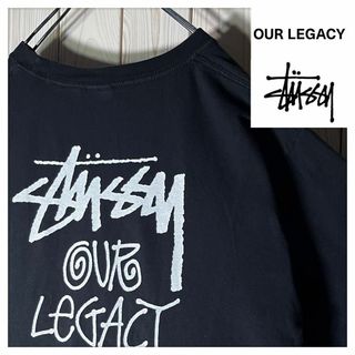 ステューシー(STUSSY)の【極美品 L】ステューシー アワーレガシー 両面ロゴ サーフマン Tシャツ 黒(Tシャツ/カットソー(半袖/袖なし))