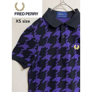 フレッドペリー(FRED PERRY)の【希少デザイン】FRED PERRY ポロシャツ 柄 千鳥柄 黄色 黒(ポロシャツ)