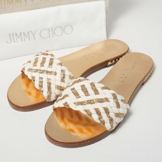 ジミーチュウ(JIMMY CHOO)の■未使用品■JIMMY CHOO ジミーチュウ 《WEAVE FLAT》 フラット サンダル レディース サイズ37 (24cm相当) キャンバス 編み込み グリッター ゴールド/ホワイト イタリア製 ブランド古着【中古】20240321/GP4618(サンダル)