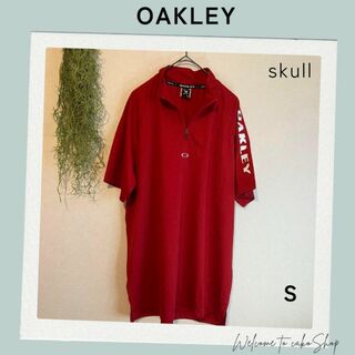 オークリー(Oakley)の美品》オークリー　スカル　赤　ハーフジップ　モックネックS スポーツ　ゴルフ(ウエア)