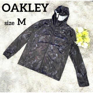 オークリー(Oakley)の【新品】オークリー☆ゴルフ☆ジャージ☆フード付き☆総柄☆黒☆M(ウエア)