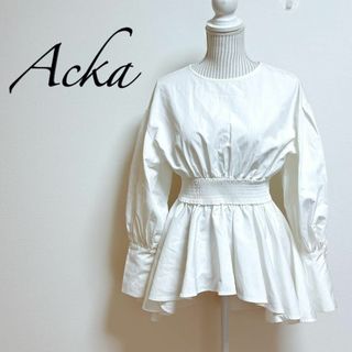 Acka. ウエストシャーリングペプラムブラウス　ボリュームスリーブ　ドレッシー(シャツ/ブラウス(長袖/七分))