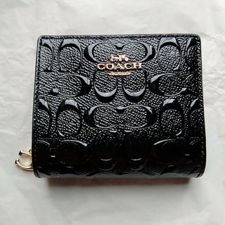 コーチ(COACH)の新品未使用　COACH折り財布 シグネチャー エンボス ブラック(財布)