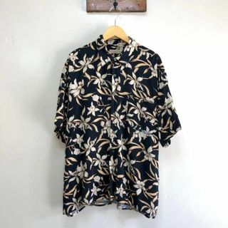 ヴィンテージ(VINTAGE)のアメリカ古着　Munsingwear　アロハシャツ　総柄　半袖シャツ　I391(シャツ)