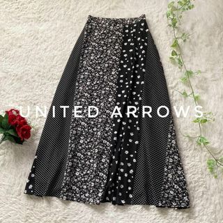 ユナイテッドアローズ(UNITED ARROWS)のユナイテッドアローズ　フラワードットプリント スカート　切替フレア　黒　36(ロングスカート)