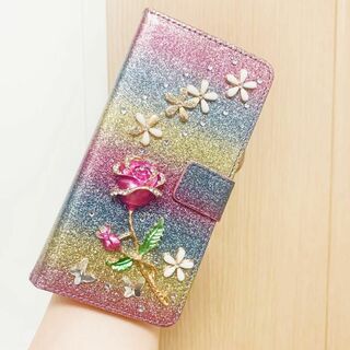 iPhone14pro　豪華3Dケース　虹色　レインボー　手帳型【一輪の花】(iPhoneケース)