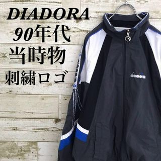 ディアドラ(DIADORA)の【k7204】ユーロ古着ディアドラ90s当時物テックトラックジャケット刺繍ロゴ黒(ナイロンジャケット)