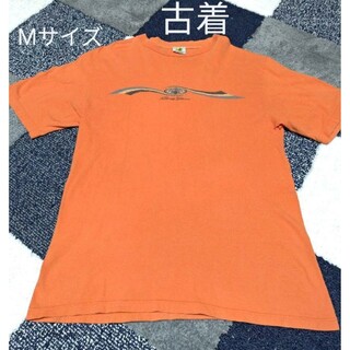 古着　プリントTシャツ　オレンジ　Mサイズ(Tシャツ/カットソー(半袖/袖なし))