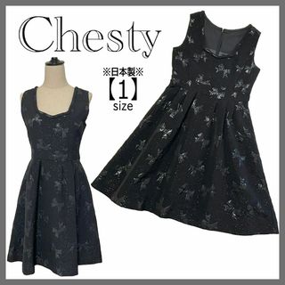 チェスティ(Chesty)の日本製 Chesty リボン ペンダゴンネック ノースリーブフレアワンピース 黒(ひざ丈ワンピース)