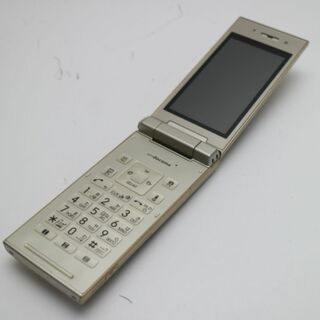パナソニック(Panasonic)のP-06C ゴールド 白ロム M777(携帯電話本体)