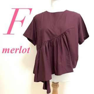 メルロープリュス(merlot plus)のメルロープリュス　半袖ブラウス　F　パープル　アシンメトリー　きれいめ(シャツ/ブラウス(半袖/袖なし))