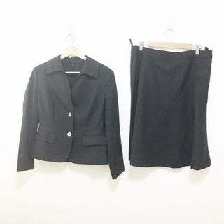 アクアスキュータム(AQUA SCUTUM)のAquascutum(アクアスキュータム) スカートスーツ レディース - 黒 肩パッド(スーツ)