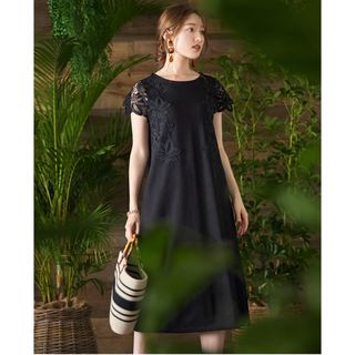 トッコクローゼット(TOCCO closet)の【新品】トッコ クローゼット サイドフラワーレース付きカットソーワンピース 黒(ロングワンピース/マキシワンピース)