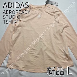 アディダス(adidas)のアディダス　エアロレディスタジオTシャツ　長袖　オレンジ　Lサイズ(ヨガ)