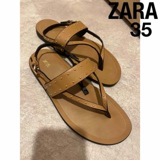 ザラ(ZARA)の新品未使用 ZARA フラット レザー スタッズ サンダル 35 ブラウン(サンダル)