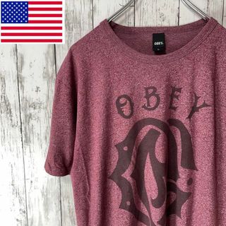 オベイ(OBEY)のOBEY USA古着 企業ロゴプリントTシャツ L 赤 USA製 メンズ(Tシャツ/カットソー(半袖/袖なし))