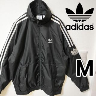 オリジナルス(Originals（adidas）)のadidas 黒 アディカラー 3Dトレフォイル ナイロンジャケット ジャージ(ナイロンジャケット)