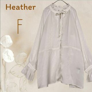 heather - b4084【ヘザー】オーバーブラウス光沢白ふんわり大人可愛い胸元リボンフリル袖