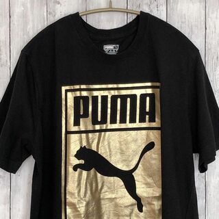 プーマ(PUMA)のプーマPUMA　半袖Ｔシャツ　黒ブラック　オーバーサイズＬ　金ロゴ　メンズ古着(Tシャツ/カットソー(半袖/袖なし))