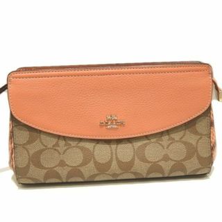 コーチ(COACH)の新品同様 COACH コーチ クラッチバッグ ☆ F73121 ベージュ系 PVC加工 × サーモンピンク系レザー セカンド ポーチ リスト付 ▼ シフト0/6D(ポーチ)