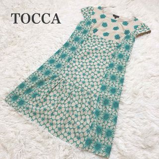 トッカ(TOCCA)の極美品✨トッカ　ワンピース カットワーク　花柄　刺繍　バックリボン　サイズM(ひざ丈ワンピース)