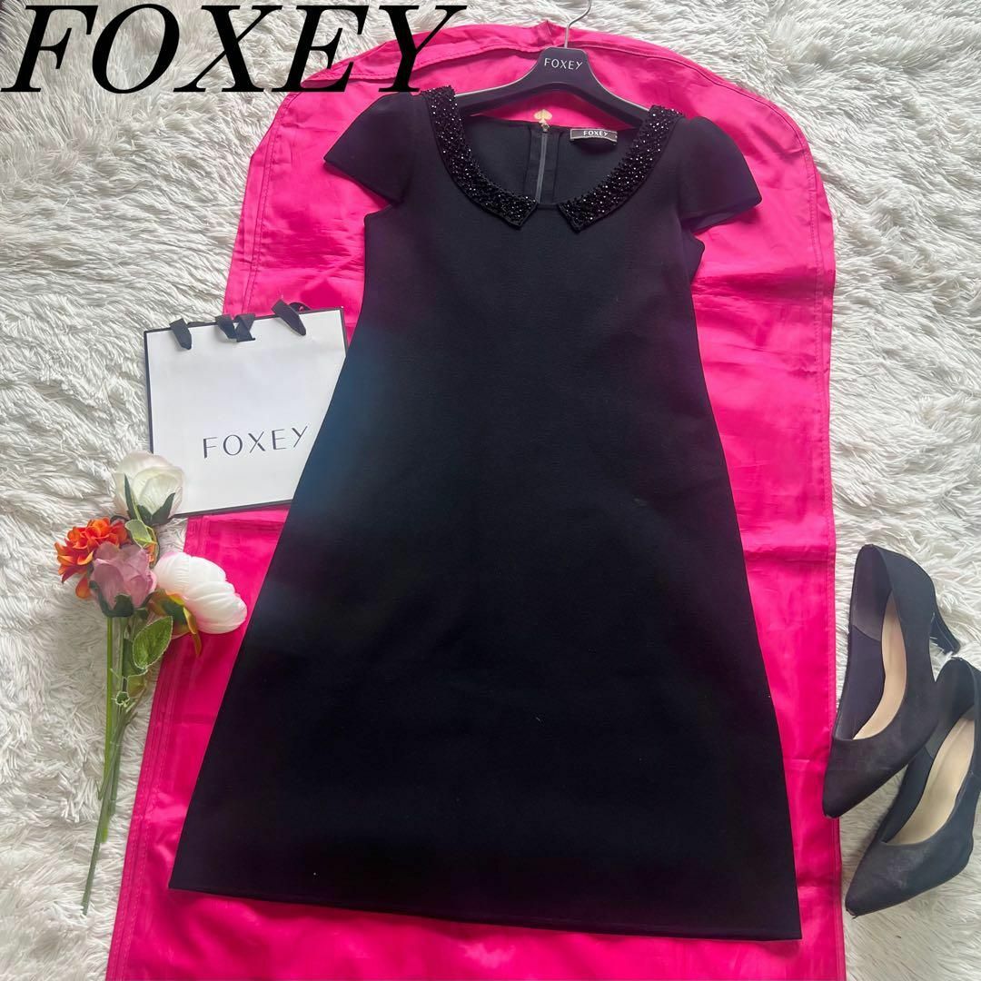 美品】FOXEY 膝丈ワンピース ブラック 38 サマーニット ビジュー 美品】FOXEY 膝丈ワンピース ブラック 38 サマーニット ビジュー