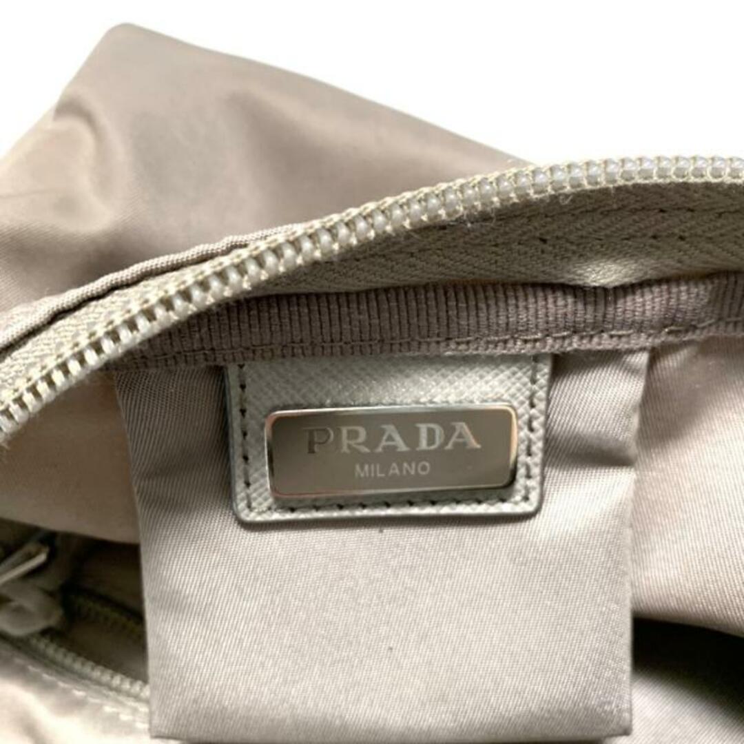 信頼も高い PRADA(プラダ) ポーチ美品 - 1NA021 ベージュ ナイロン バッグ