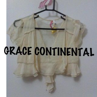 グレースコンチネンタル(GRACE CONTINENTAL)のグレースコンチネンタル後ろリボンボレロ(その他ドレス)