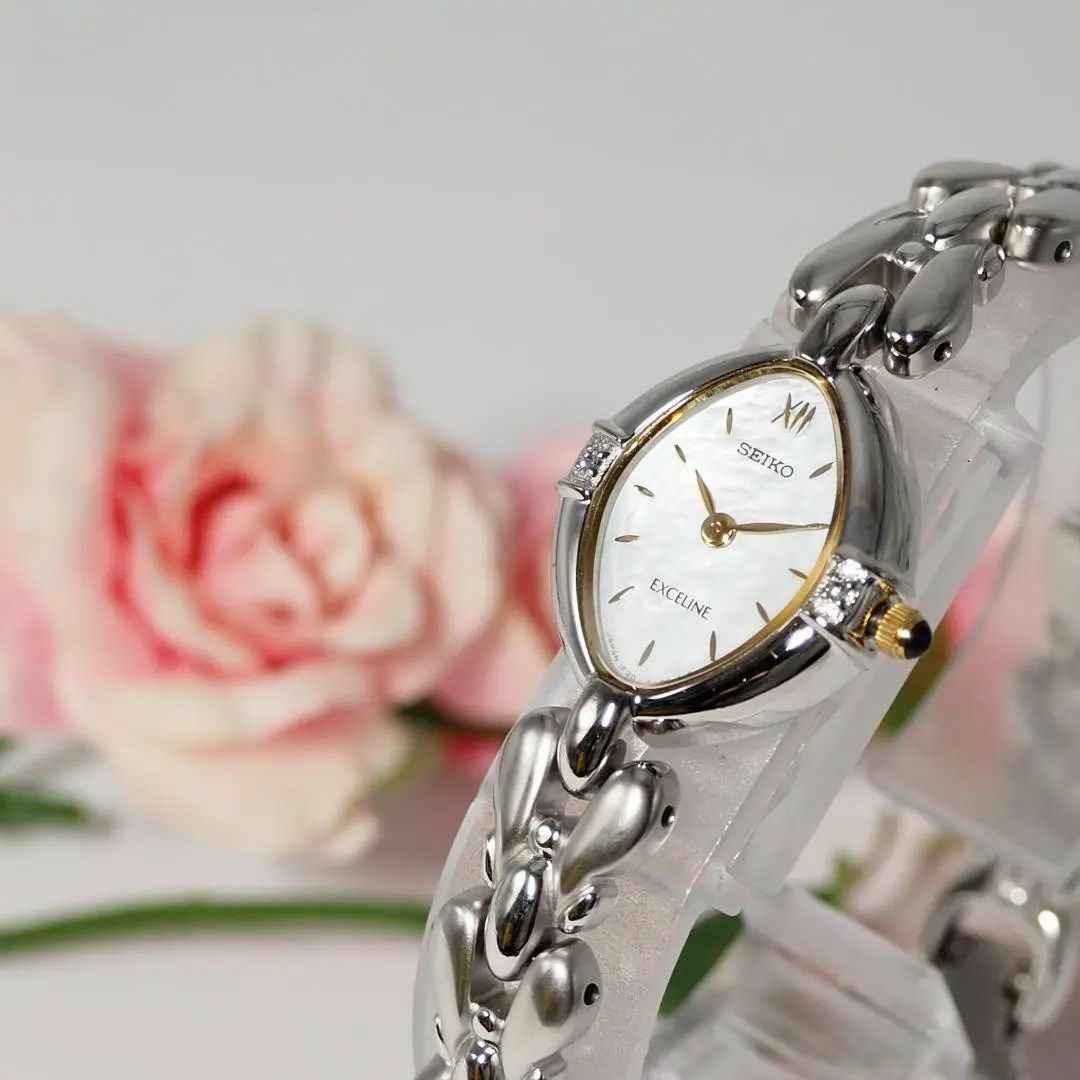 美品 エクセリーヌ SEIKO 1Pダイヤ 摘む バングルウォッチ 美品 エクセリーヌ SEIKO 1Pダイヤ 摘む バングルウォッチ