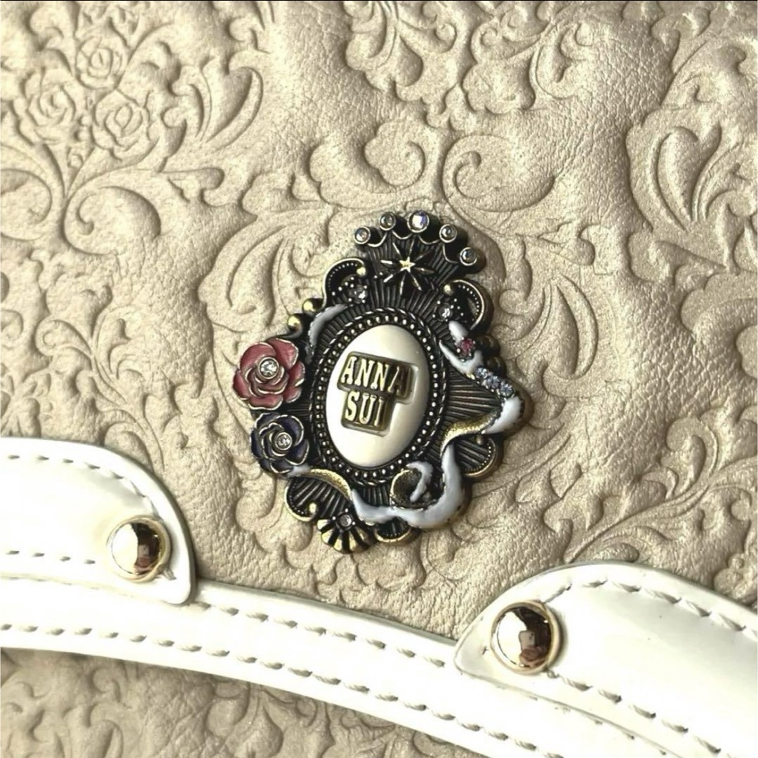新品同様】ANNA SUI アナスイ セルパン 口金長財布 ゴールド がま口 新品同様】ANNA SUI アナスイ セルパン 口金長財布 ゴールド がま口