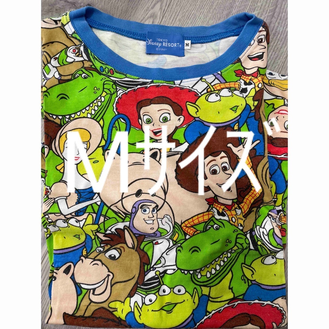 Disney(ディズニー)のトイストーリー 総柄Tシャツ Mサイズ エンタメ/ホビーのおもちゃ/ぬいぐるみ(キャラクターグッズ)の商品写真