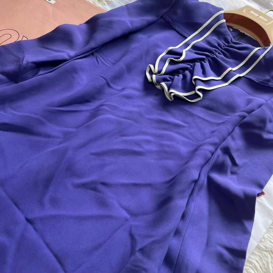 美品】MIU MIU 膝丈ワンピース フリル フレア 長袖 36 S パープル 美品】MIU MIU 膝丈ワンピース フリル フレア 長袖 36 S パープル