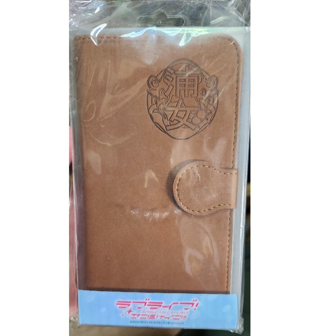 角川書店(カドカワショテン)のラブライブサンシャイン スマホケース キャメル色 浦女生徒手帳風 スマホ/家電/カメラのスマホアクセサリー(モバイルケース/カバー)の商品写真