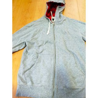ステューシー(STUSSY)のSTUSSY　グレー フード付きパーカー　サイズL(パーカー)