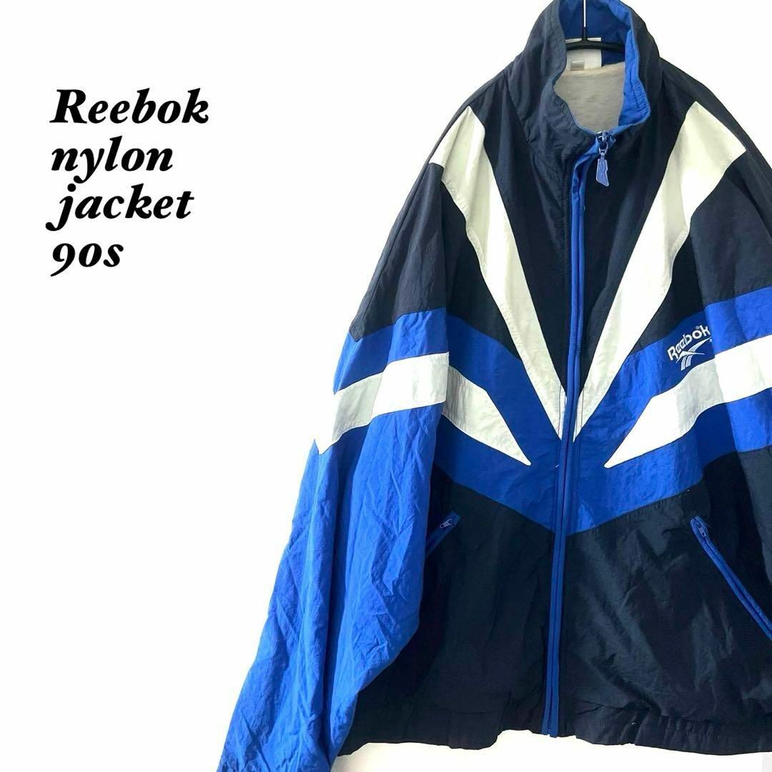 Reebok - Reebokリーボックナイロンジャケット90s当時物刺繍ロゴ Reebok - Reebokリーボックナイロンジャケット90s当時物刺繍ロゴ