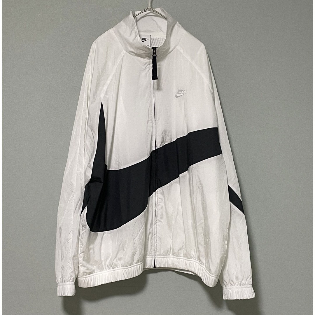 NIKE - 2XL 新品 ナイキ ナイロンジャケット スウッシュウーブン NIKE - 2XL 新品 ナイキ ナイロンジャケット スウッシュウーブン