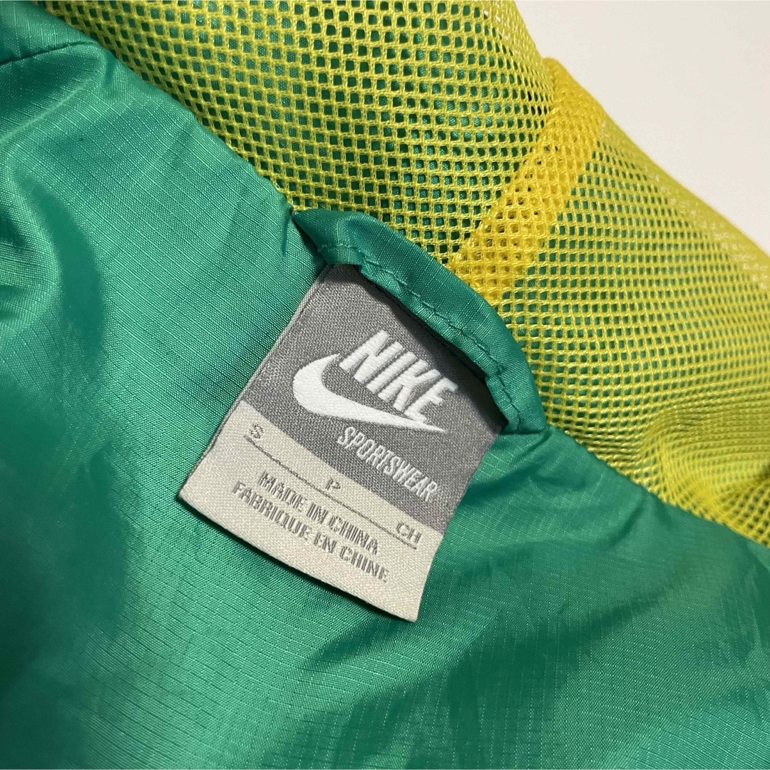 NIKE - NIKE 風車 ナイロンパーカー オレゴンカラーの通販 by NIKE - NIKE 風車 ナイロンパーカー オレゴンカラーの通販 by