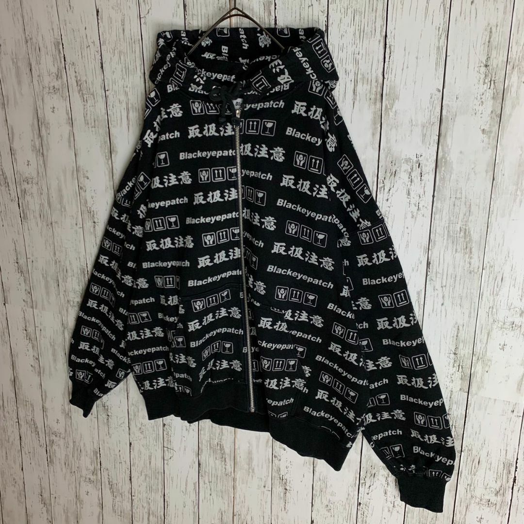 即完売Lサイズ】ブラックアイパッチ☆取扱注意ロゴ総柄ジップ 即完売Lサイズ】ブラックアイパッチ☆取扱注意ロゴ総柄ジップ