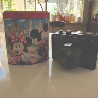 空き缶２種（ディズニー・カメラ）