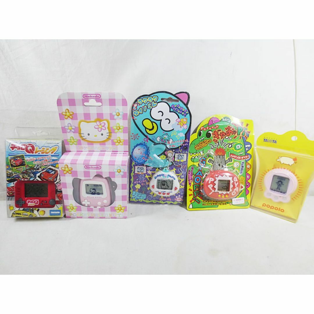 BANDAI(バンダイ)の新品 ラクラクタイノ キティ 万歩計 ぎゃおッPi タニタ チョロQ ゲーム デジタル ペット セット エンタメ/ホビーのゲームソフト/ゲーム機本体(その他)の商品写真