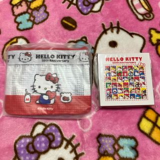 サンリオ(サンリオ)のサンリオ　キティ ビニールフラットポーチ　メモ（HELLO みんな！）　新品(キャラクターグッズ)