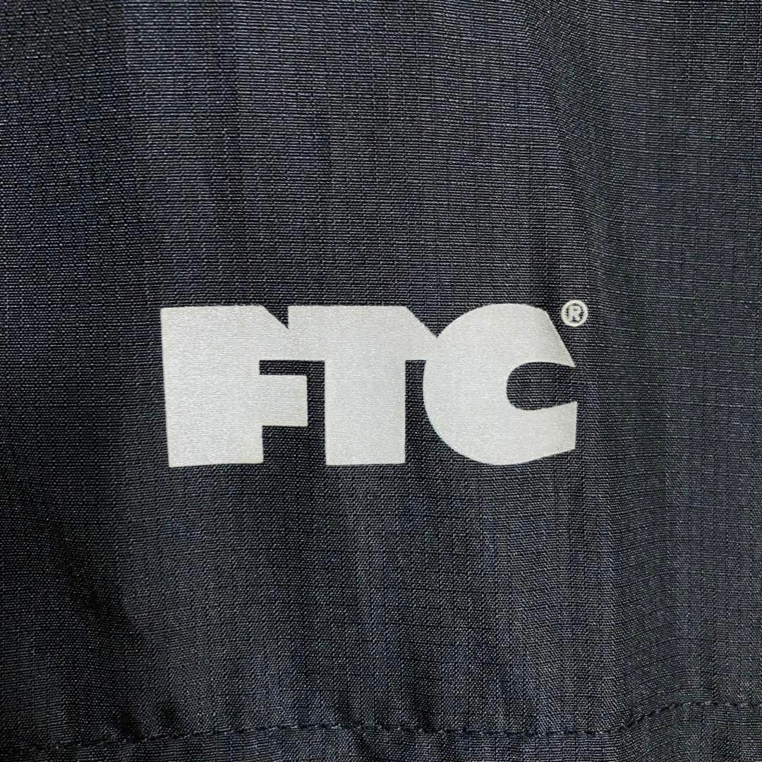 美品】FTC フード付きフルジップナイロンジャケット 人気Lサイズ 黒 美品】FTC フード付きフルジップナイロンジャケット 人気Lサイズ 黒