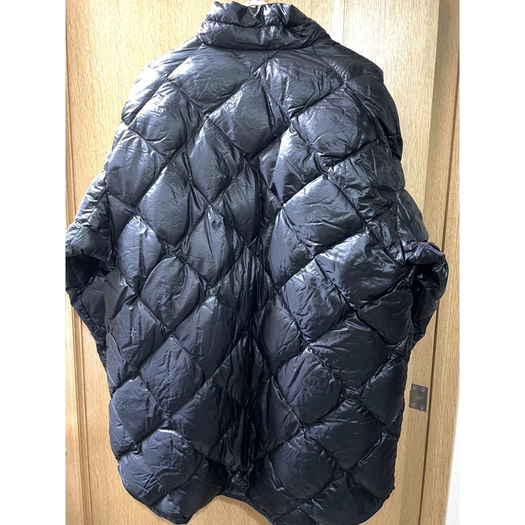 mont bell(モンベル)のL モンベル　ダウンジャケット　ブラック　収納バッグ　軽量　防寒　アウトドア メンズのジャケット/アウター(ダウンジャケット)の商品写真