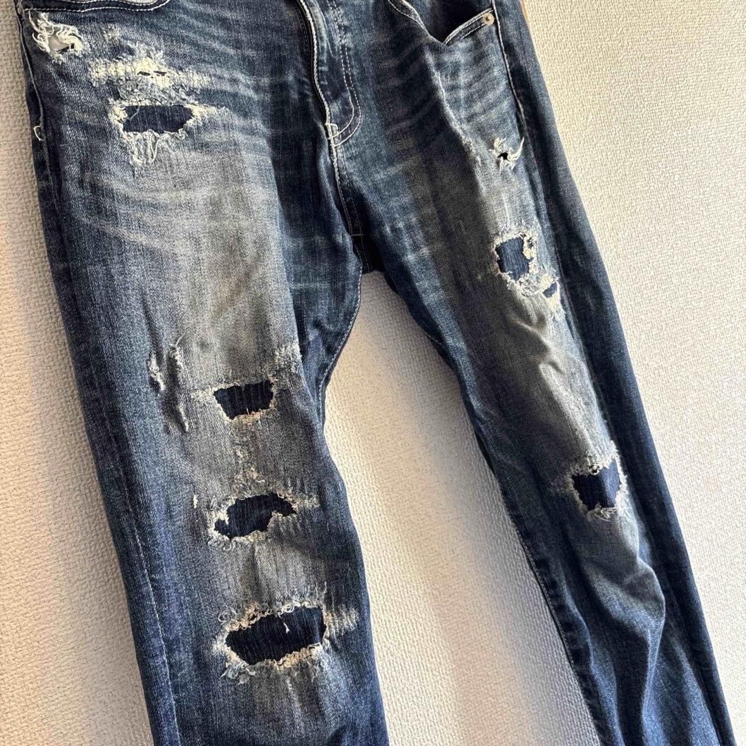 AZUL by moussy(アズールバイマウジー)のAZUL BY MOUSSY ダメージデニムパンツ L メンズのパンツ(デニム/ジーンズ)の商品写真