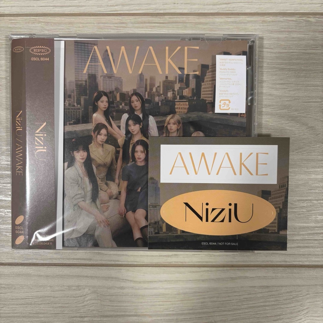 NiziU(ニジュー)の【開封のみ未再生】NiziU AWAKE 通常盤 エンタメ/ホビーのCD(ポップス/ロック(邦楽))の商品写真