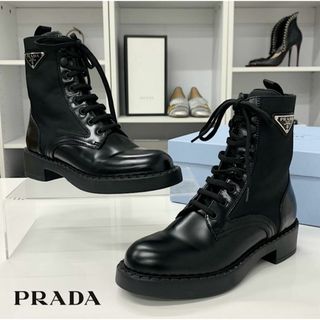 PRADA - 【美品⭐︎現行モデル】プラダ レザー コンバット PRADA - 【美品⭐︎現行モデル】プラダ レザー コンバット